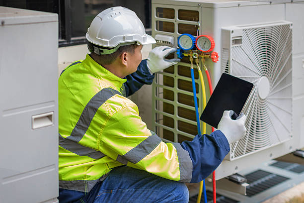 Professional Hvac technician working in Caroga Lake, NY